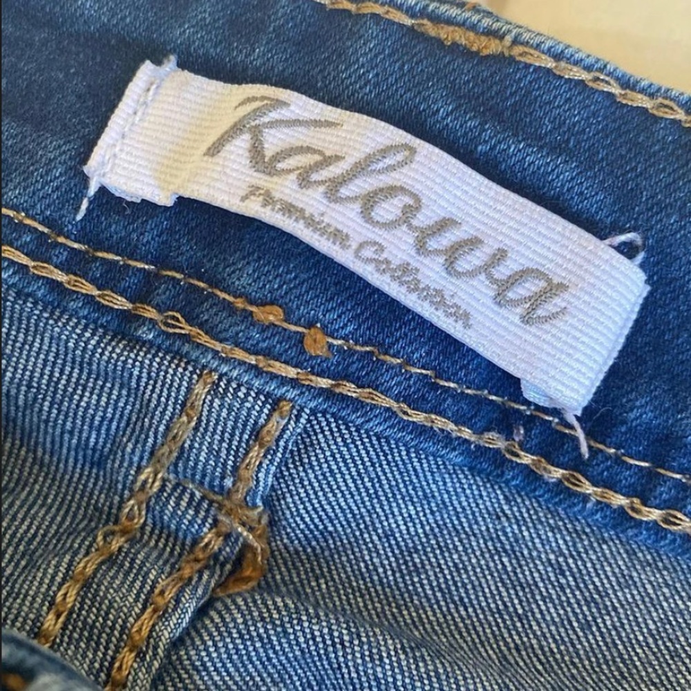 Dark blue ripped jeans